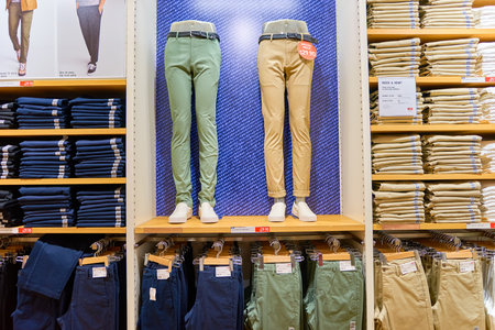 NEW-YORK - MARCH 20, 2016: inside of Uniqlo store. Uniqlo Co., Ltd. is a Japanese casual wear designer, manufacturer and retailer.のeditorial素材