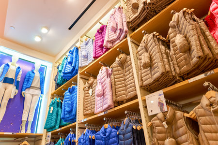 NEW-YORK - MARCH 20, 2016: inside of Uniqlo store. Uniqlo Co., Ltd. is a Japanese casual wear...