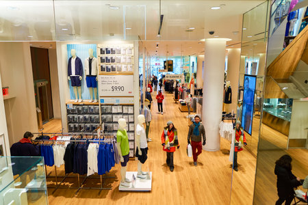 NEW-YORK - MARCH 20, 2016: inside of Uniqlo store. Uniqlo Co., Ltd. is a Japanese casual wear designer, manufacturer and retailer.のeditorial素材