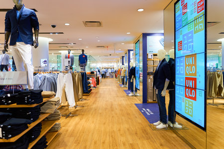 NEW-YORK - MARCH 20, 2016: inside of Uniqlo store. Uniqlo Co., Ltd. is a Japanese casual wear...