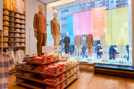 NEW-YORK - MARCH 20, 2016: inside of Uniqlo store. Uniqlo Co., Ltd. is a Japanese casual wear designer, manufacturer and retailer.のeditorial素材