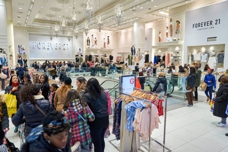 NEW YORK - MARCH 19, 2016: inside of Forever 21 in New-York. Forever 21 is an American chain of fast fashion retailers with its headquarters in Los Angeles.のeditorial素材
