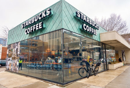 CHICAGO, IL - MARCH 24, 2016: exterior of Starbucks Cafe. Starbucks Corporation is an American global coffee company and coffeehouse chain based in Seattle, Washingtonのeditorial素材