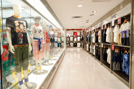 CHICAGO, IL - MARCH 24, 2016: inside of Uniqlo store. Uniqlo Co., Ltd. is a Japanese casual wear designer, manufacturer and retailer.のeditorial素材
