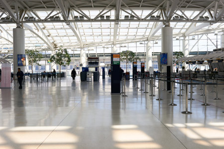 NEW YORK - MARCH 22, 2016: inside of JFK airport. John F. Kennedy International Airport is a major international airport located in Queens, New York City, United States.のeditorial素材