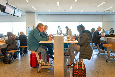 NEW YORK - MARCH 22, 2016: inside of JFK airport. John F. Kennedy International Airport is a major international airport located in Queens, New York City, United States.のeditorial素材