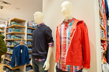 CHICAGO, IL - MARCH 24, 2016: inside of Uniqlo store. Uniqlo Co., Ltd. is a Japanese casual wear designer, manufacturer and retailer.のeditorial素材