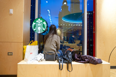 CHICAGO, IL - CIRCA MARCH, 2016: inside of Starbucks Cafe. Starbucks Corporation is an American...