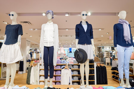 CHICAGO, IL - MARCH 24, 2016: inside of Uniqlo store. Uniqlo Co., Ltd. is a Japanese casual wear designer, manufacturer and retailer.のeditorial素材