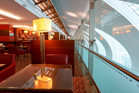 DUBAI, UAE - MARCH 09, 2016: interior of Emirates business class lounge. Emirates is the largest airline in the Middle East. It is an airline based in Dubai, United Arab Emirates.のeditorial素材