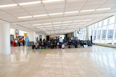 NEW YORK - APRIL 06, 2016: inside of JFK airport. John F. Kennedy International Airport is a major international airport located in Queens, New York City, United States.のeditorial素材