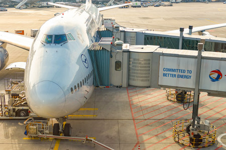 FRANKFURT, GERMANY - MARCH 13, 2016: Lufthansa aircraft docked in Frankfurt Airport. Frankfurt Airport is a major international airport located in Frankfurtのeditorial素材