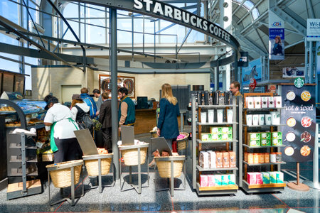 CHICAGO, IL - CIRCA APRIL, 2016: Starbucks Cafe at O'Hare Airport. Starbucks Corporation is an American global coffee company and coffeehouse chain based in Seattle, Washingtonのeditorial素材