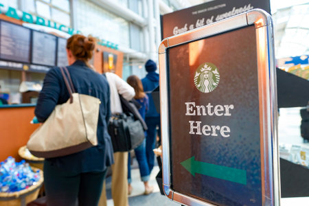CHICAGO, IL - CIRCA APRIL, 2016: Starbucks Cafe at O'Hare Airport. Starbucks Corporation is an American global coffee company and coffeehouse chain based in Seattle, Washingtonのeditorial素材