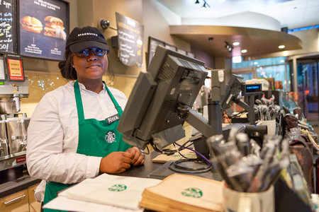 CHICAGO, IL - CIRCA APRIL, 2016: inside of Starbucks Cafe. Starbucks Corporation is an American global coffee company and coffeehouse chain based in Seattle, Washingtonのeditorial素材