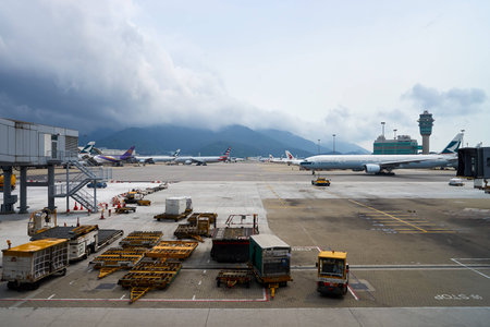HONG KONG - APRIL 09, 2016: Cathay Pacific aircraft in Hong Kong Airport. Cathay Pacific is the flag carrier of Hong Kongのeditorial素材