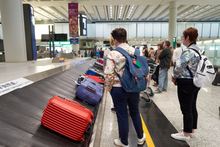 HONG KONG - APRIL 09, 2016: baggage claim area in Hong Kong International Airport. Hong Kong...
