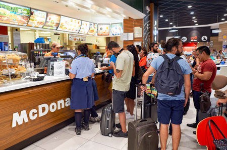 ROME, ITALY - AUGUST 04, 2015: McDonald's in Fiumicino Airport. The McDonald's Corporation is the world's largest chain of hamburger fast food restaurantsのeditorial素材