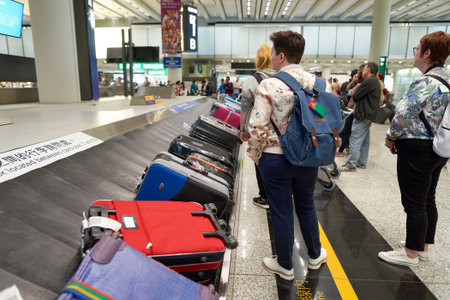 HONG KONG - APRIL 09, 2016: baggage claim area in Hong Kong International Airport. Hong Kong International Airport is the main airport in Hong Kongのeditorial素材