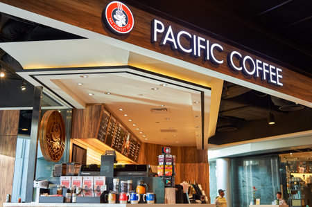 HONG KONG - JUNE 03, 2015: Pacific Coffee cafe interior. Pacific Coffee Company is a Pacific Northwest U.S.- style coffee shop group originating from Hong Kong, with a few outlets in China, Singapore and Malaysiaのeditorial素材