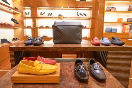 KUALA LUMPUR, MALAYSIA - MAY 09, 2016: inside of Louis Vuitton store. Louis Vuitton Malletier, commonly referred to as Louis Vuitton, or shortened to LV, is a French fashion house founded in 1854 by Louis Vuitton.のeditorial素材