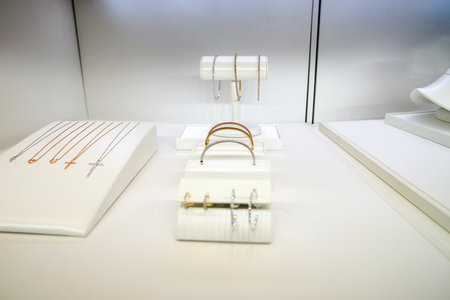 KUALA LUMPUR, MALAYSIA - MAY 09, 2016: showcase at Tiffany store. Tiffany & Company (known colloquially as Tiffany or Tiffany's) is an American worldwide luxury jewelry and specialty retailer, headquartered in New York Cityのeditorial素材