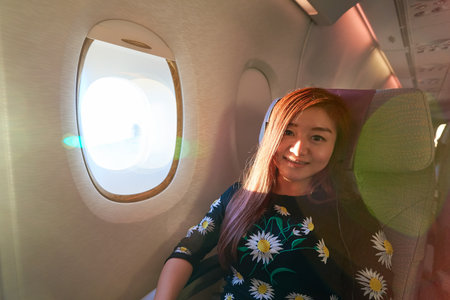 HONG KONG - MARCH 08, 2016: passenger in Emirates Airbus A380. The Airbus A380 is a double-deck,...
