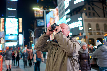 NEW YORK - CIRCA MARCH, 2016: man taking photos in New York. The City of New York, often called New York City or simply New York, is the most populous city in the United Statesのeditorial素材