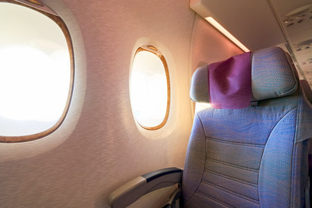 HONG KONG - MARCH 08, 2016: inside of Emirates Airbus A380. The Airbus A380 is a double-deck, wide-body, four-engine jet airliner manufactured by Airbus. It is the world's largest passenger airliner.のeditorial素材