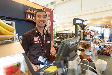 DUBAI, UAE - MARCH 09, 2016: Costa Coffee at Dubai International Airport. Costa Coffee is a British multinational coffeehouse company. It is the second largest coffeehouse chain in the world behind Starbucks.のeditorial素材