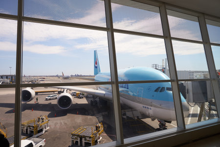 NEW YORK - APRIL 06, 2016: Korean Air A380 docked in JFK Airport. Korean Air, is the largest airline in South Korea based on fleet size, international destinations and international flights.のeditorial素材
