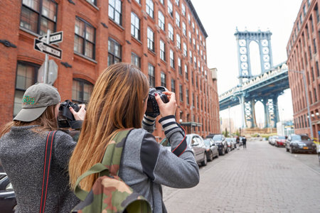 NEW YORK - CIRCA MARCH, 2016: woman taking photos in New York. The City of New York, often called New York City or simply New York, is the most populous city in the United Statesのeditorial素材