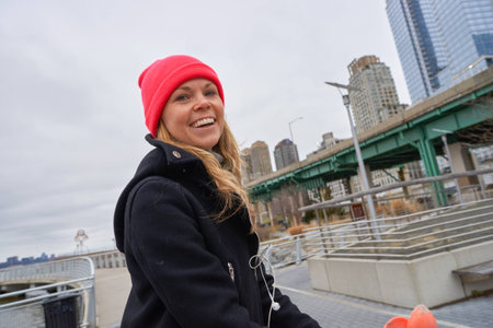 NEW YORK - CIRCA MARCH, 2016: outdoor lifestyle portrait of young woman in New York. The City of New...