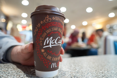 NEW YORK - CIRCA MARCH, 2016: close up shot of cup with McCafe logo. McCafe is a coffee-house-style...