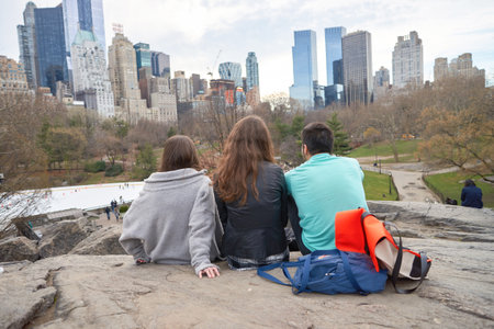 NEW YORK - CIRCA MARCH, 2016: outdoor lifestyle portrait of young people in Central Park. Central Park is an urban park in middle-upper Manhattan, within New York City.のeditorial素材