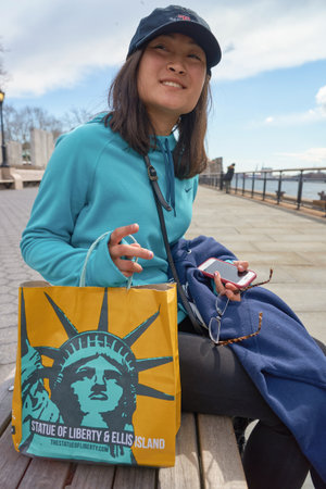 NEW YORK - CIRCA MARCH, 2016: outdoor portrait of young woman in New York. The City of New York is the most populous city in the United Statesのeditorial素材