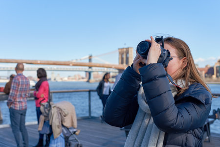 NEW YORK - CIRCA MARCH, 2016: woman taking photos in New York. The City of New York, often called New York City or simply New York, is the most populous city in the United Statesのeditorial素材