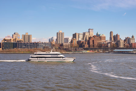 NEW YORK - MARCH 17, 2016: view from Pier 15 at daytime. Pier 15 is located east of South Street and FDR Drive in Lower Manhattan, New York City.のeditorial素材