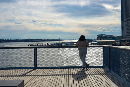 NEW YORK - MARCH 17, 2016: view from Pier 15 at daytime. Pier 15 is located east of South Street and FDR Drive in Lower Manhattan, New York City.のeditorial素材