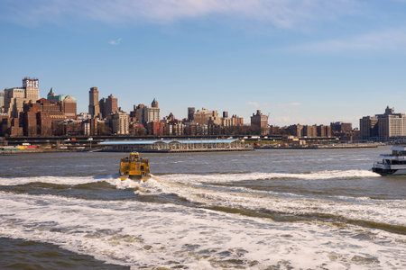 NEW YORK - MARCH 17, 2016: view from Pier 15 at daytime. Pier 15 is located east of South Street and FDR Drive in Lower Manhattan, New York City.のeditorial素材