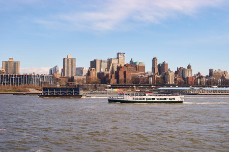 NEW YORK - MARCH 17, 2016: view from Pier 15 at daytime. Pier 15 is located east of South Street and FDR Drive in Lower Manhattan, New York City.のeditorial素材