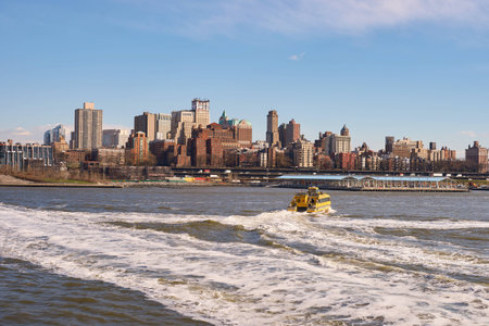 NEW YORK - MARCH 17, 2016: view from Pier 15 at daytime. Pier 15 is located east of South Street and...