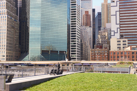 NEW YORK - MARCH 17, 2016: Pier 15 at daytime. Pier 15 is located east of South Street and FDR Drive in Lower Manhattan, New York City.のeditorial素材