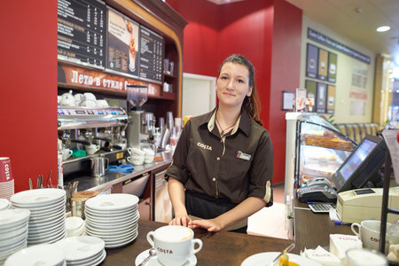 SAINT PETERSBURG, RUSSIA - CIRCA JULY, 2015: barista in Costa Coffee. Costa Coffee is a British multinational coffeehouse company. It is the second largest coffeehouse chain in the world behind Starbucks.のeditorial素材