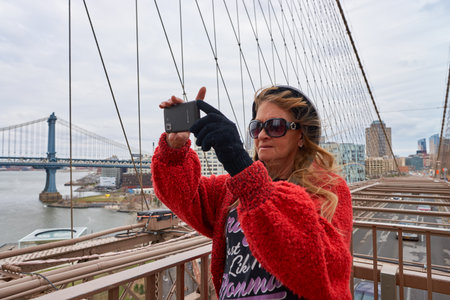 NEW YORK - CIRCA MARCH, 2016: woman taking photos in New York. The City of New York, often called New York City or simply New York, is the most populous city in the United Statesのeditorial素材