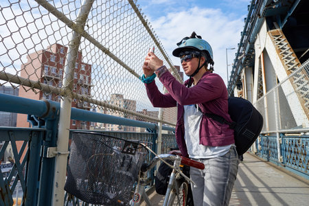 NEW YORK - CIRCA MARCH, 2016: woman taking photos in New York. The City of New York, often called New York City or simply New York, is the most populous city in the United Statesのeditorial素材