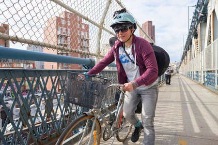 NEW YORK - CIRCA MARCH, 2016: outdoor lifestyle portrait of bicyclist in New York. The City of New York is the most populous city in the United Statesのeditorial素材
