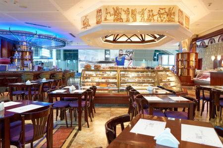 DUBAI, UAE - APRIL 08, 2016: inside of Dubai International Airport. There are a lot of restaurants, bars, cafes and shops in Dubai International Airport. Almost all of them are open twenty-four hours.のeditorial素材