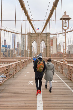 NEW YORK - CIRCA MARCH, 2016: view from the pedestrian walkway of the Brooklyn Bridge. The Brooklyn Bridge is connects the boroughs of Manhattan and Brooklyn by spanning the East River.のeditorial素材
