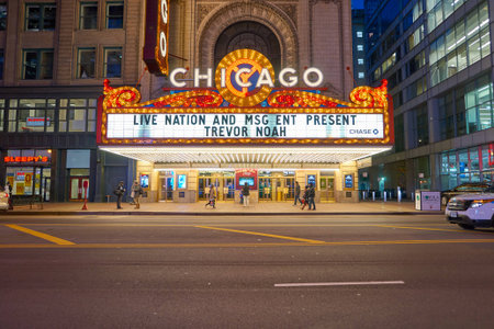 CHICAGO, IL - CIRCA MARCH, 2016: facade of Chicago Theatre at night time. The Chicago Theatre is a landmark theater located on North State Street in the Loop area of Chicago, Illinois.のeditorial素材